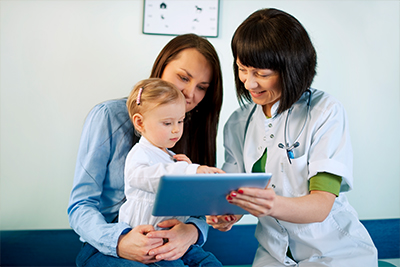 Doctor treating a child